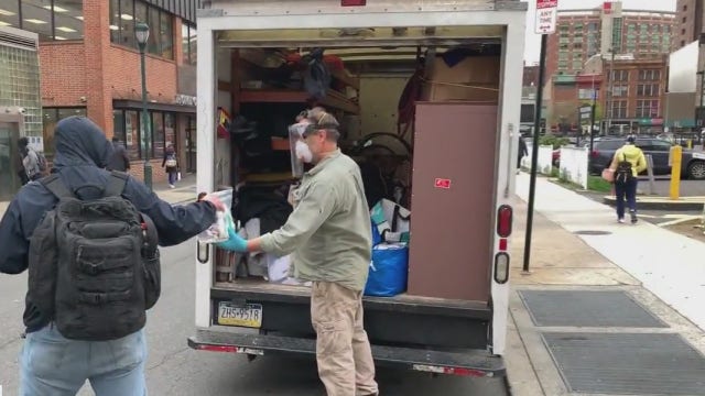 Volunteers hand out 'blessing bags' to help homeless
