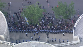 Protesters gather outside Philadelphia police headquarters as citywide looting, riots continue