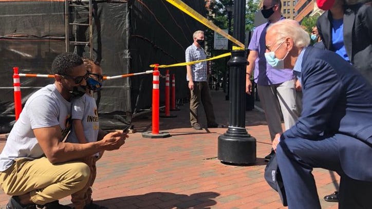 Joe Biden Shares Picture Of Himself Kneeling With Demonstrator At