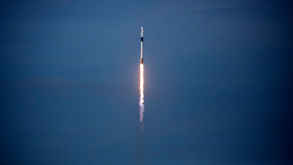 5112a19f-SpaceX Falcon-9 Rocket And Crew Dragon Capsule Launches From Cape Canaveral Sending Astronauts To The International Space Station