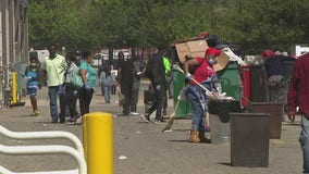 West Philadelphia community comes together to clean up following riots, looting