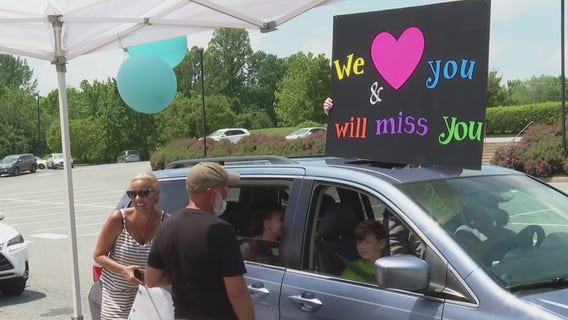 Retirement drive-by parade held for beloved principal