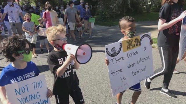Local 7-year-old boy organizes Black Lives Matter march