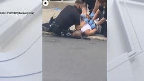 DA to investigate video showing Allentown police officer kneeling on man