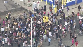 Crowd gathers at scene where man was shot and killed by police on Detroit's west side