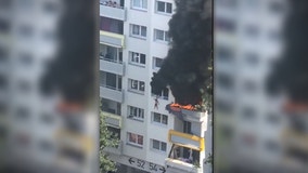 2 boys saved when caught in falls in French apartment fire