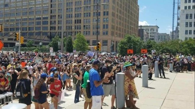 Protesters gather to denounce alleged racism at Masterman School