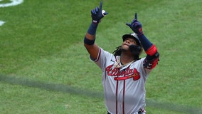 Acuna homers to lead Braves past Phillies 5-2 in first of 2