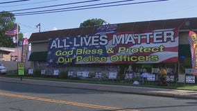 Group gathers to protest after Oaklyn business owner puts up "All Lives Matter" banner