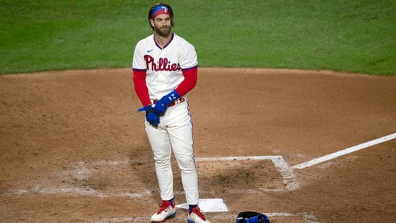 Phillies fail to sweep Blue Jays; Harper has stiff back