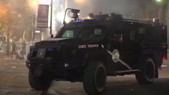 2 police officers shot amid protests in Louisville, 1 suspect in custody