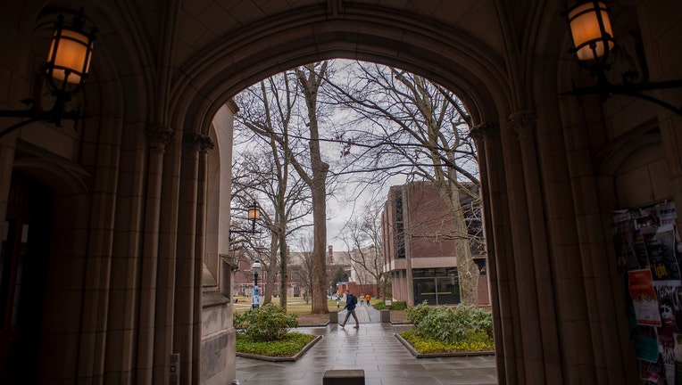 A man walks on campus at Princeton University. 