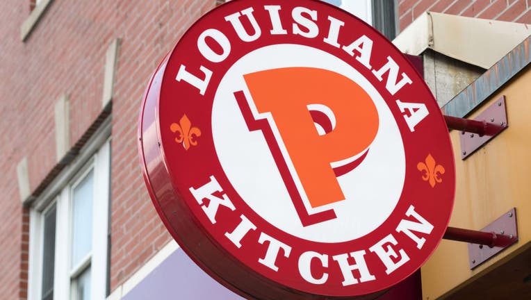 Popeyes Lousiana Kitchen sing or logo outside a restaurant