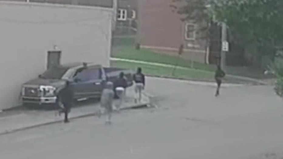 Surveillance video recovered from the area shows a group of suspects exiting a gray Dodge Durango with a temporary Delaware tag.