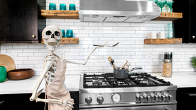 Real estate agent decorates homes with giant skeletons to drum up exposure