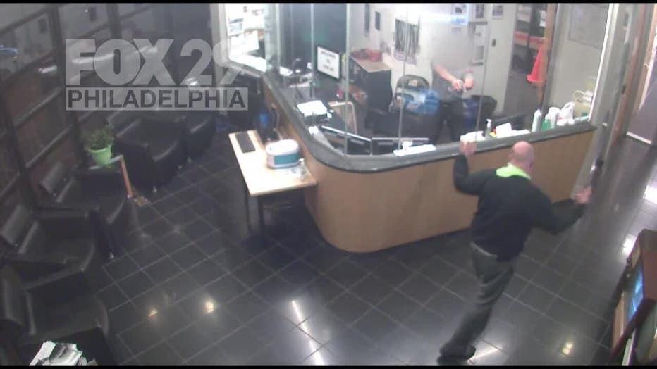 Intruder confronted by security in FOX 29 Lobby