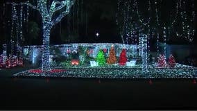 Orlando couple honors COVID-19 victims with 220k Christmas light display