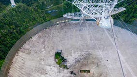 Puerto Rico's iconic Arecibo radio telescope to close in blow to science