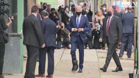 Biden shows off walking boot on his injured foot