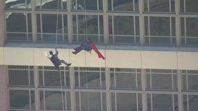 Superheroes surprise young patients at Houston's MD Anderson Cancer Center