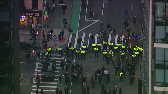 Car hits protesters in Manhattan