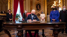 Biden signs executive orders on COVID-19, immigration, rejoining Paris climate accord and WHO