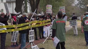 Mariachi band plays as protestors gather outside Sen. Ted Cruz's Houston home