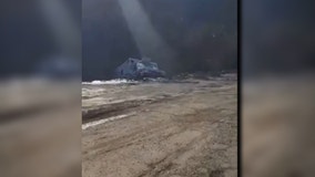 Vehicles swallowed when massive embankment collapses in Kentucky