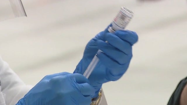 Wolf: Vaccine 'winning' against virus despite state surge