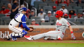 Phillies edge past Braves 7-6 on controversial play at the plate