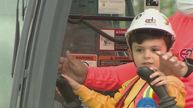 Boy battling cancer becomes construction worker for the day