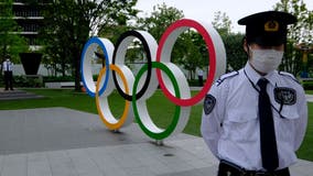 Olympic officials try to reassure athletes over coronavirus waiver