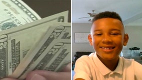 9-year-old finds $5,000 under floor mat while cleaning family SUV