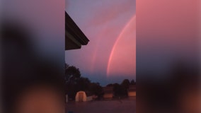 Stunning sunset with double rainbow seen after Midwest storm