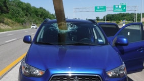 Wooden board impales windshield after flying off truck on Ohio interstate