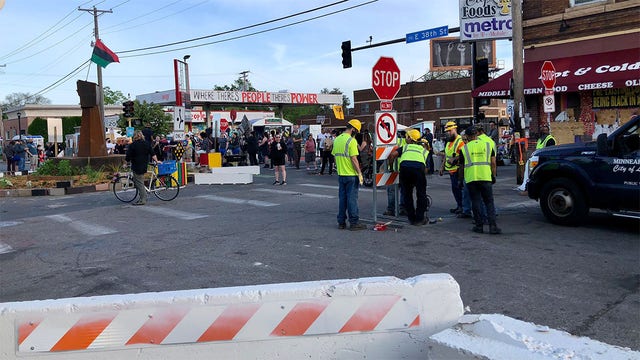 City crews remove barriers around George Floyd Square, activists restore them