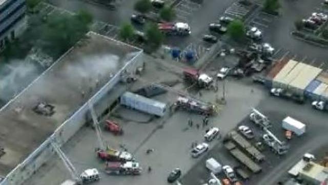 Firefighters battle 2-alarm blaze in Blue Bell