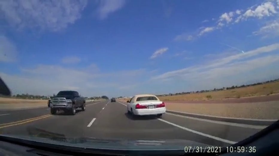 The truck on the left is a reported wrong-way driver caught by John Furman's dashcam on July 31, 2021