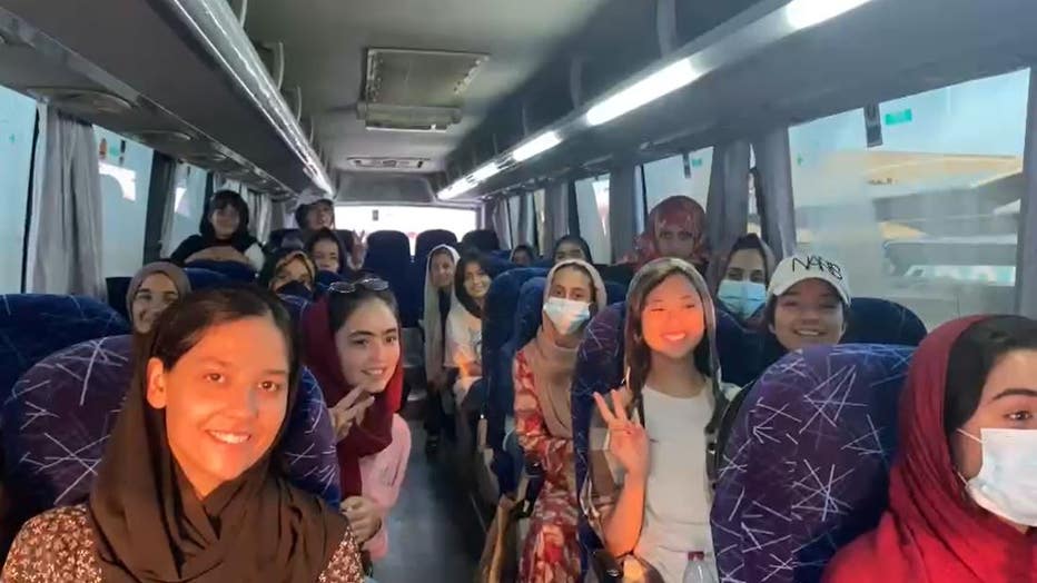Afghan girls robitcs team on bus