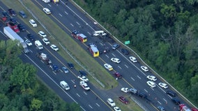 1 killed, dozen hurt when van overturns on I-295 near Hamilton Township