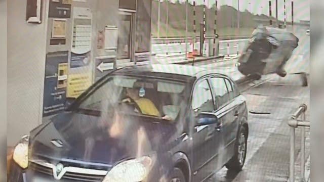 Video shows 'drug driver' crash into toll booth, car, UK police say