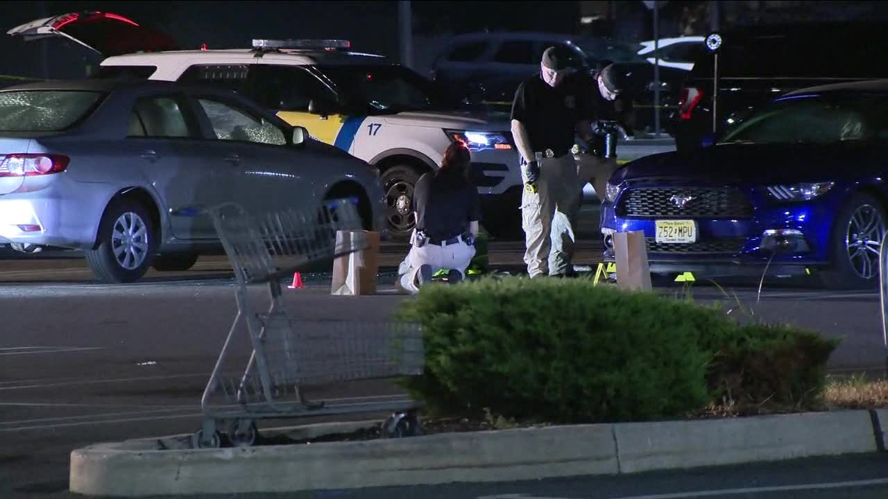father injured teenage son killed in shooting outside burlington township walmart officials say