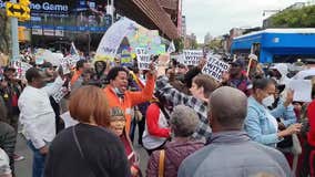 Anti-vaccine mandate demonstrators rush barricades at Nets game