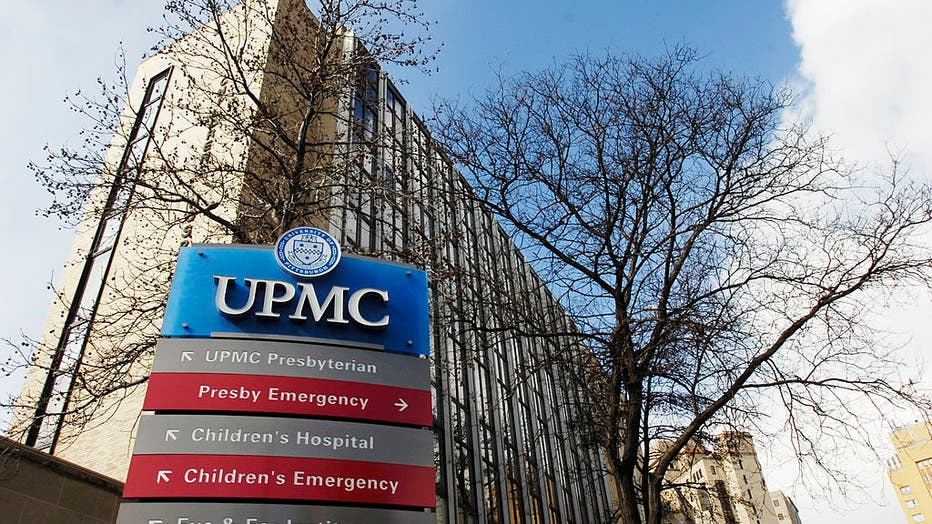 A sign points to areas on the University of Pittsburgh Medic