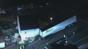 Minor injuries reported after tractor-trailer crashes into house in Berks County