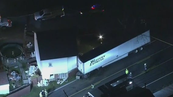 Minor injuries reported after tractor-trailer crashes into house in Berks County