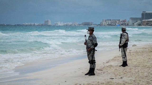 Shots fired at Cancun beach after gunmen arrive on jet skis, police say