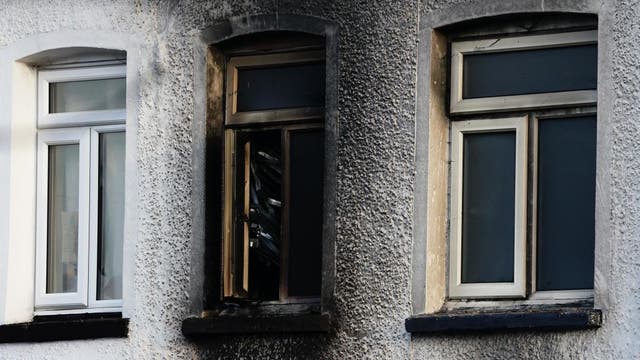 Two sets of twins killed in house fire in London, woman arrested