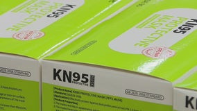 Camden officials distribute KN95 masks, as slow rollout of free masks nationwide begins