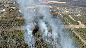 Over 1,000 homes evacuated as firefighters battle Florida Panhandle fires